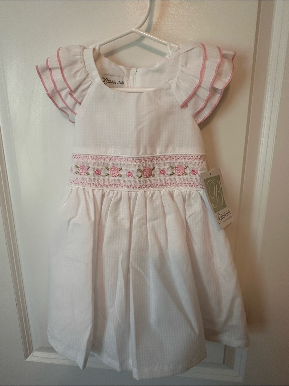 Bonnie Jean White Dress with Pink Trim and Rose Smocking
